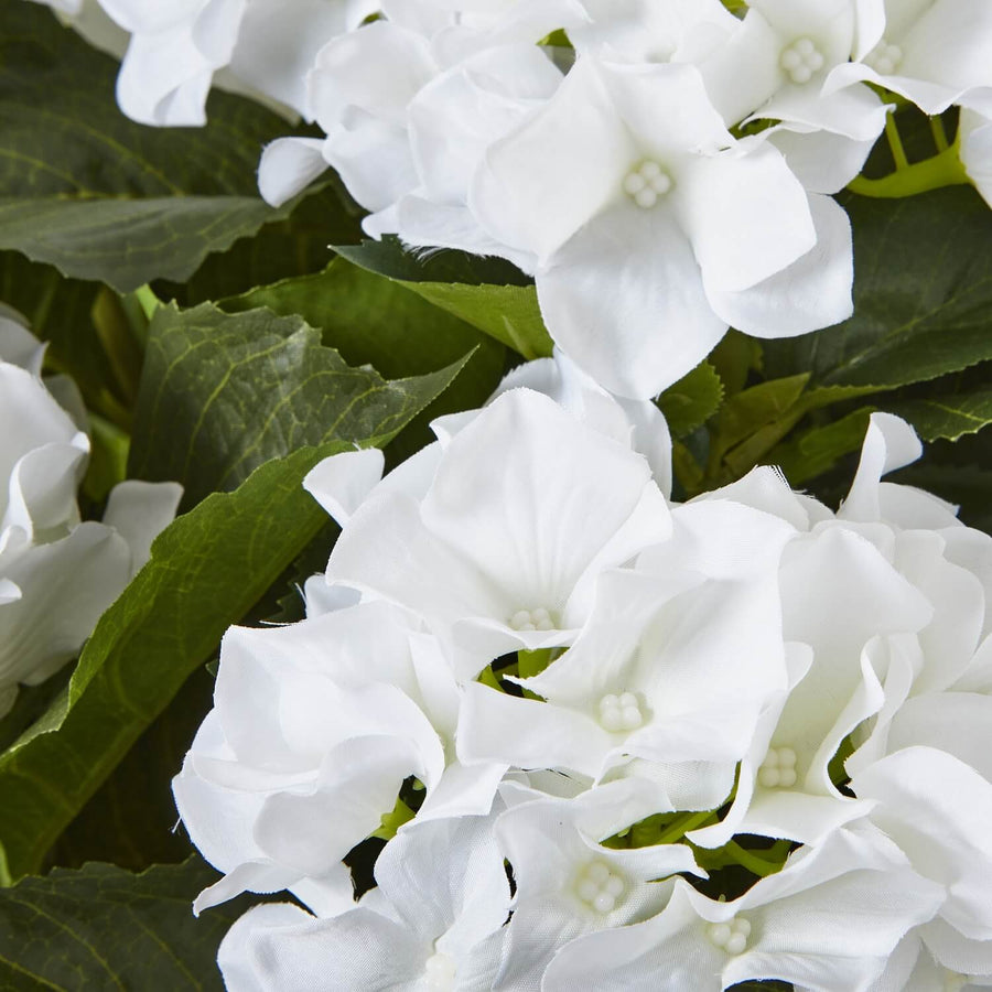 White faux hydrangea arrangement in vase, realistic velvet petals and lush foliage, 31-inch luxury floral centerpiece by Sostter at brixbailey.com