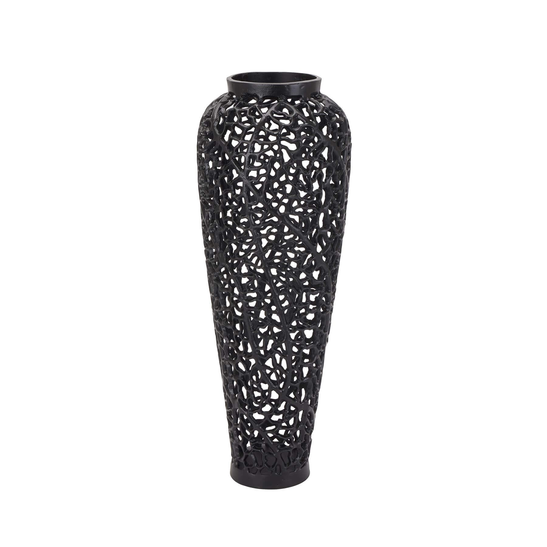 Matte black lattice vase with geometric cutouts, casting dynamic shadows, made of architectural-grade aluminum. by Sostter at brixbailey.com
