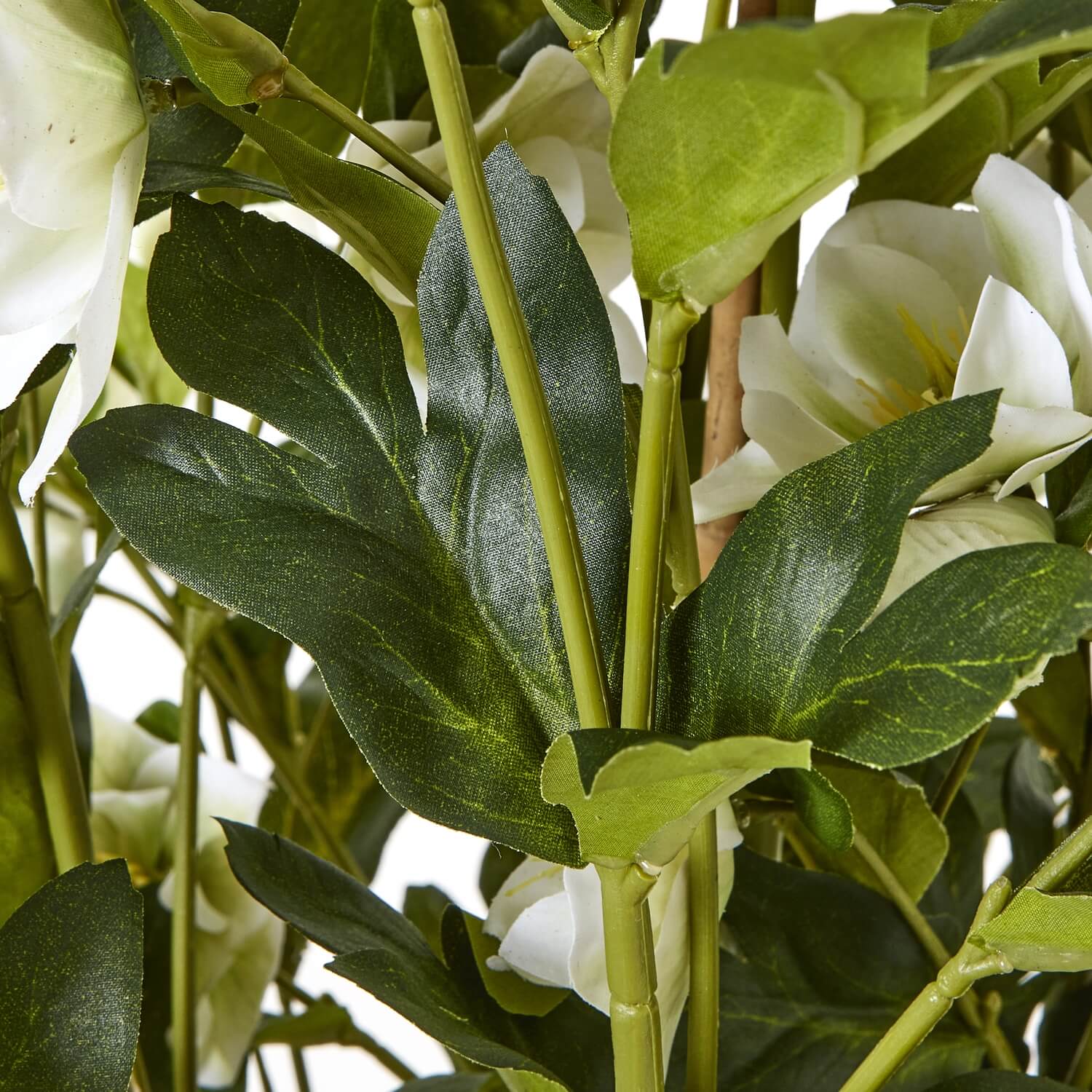 White faux hellebore floral arrangement in grey planter, lifelike blooms with green stems, home decor centerpiece by Sostter at brixbailey.com
