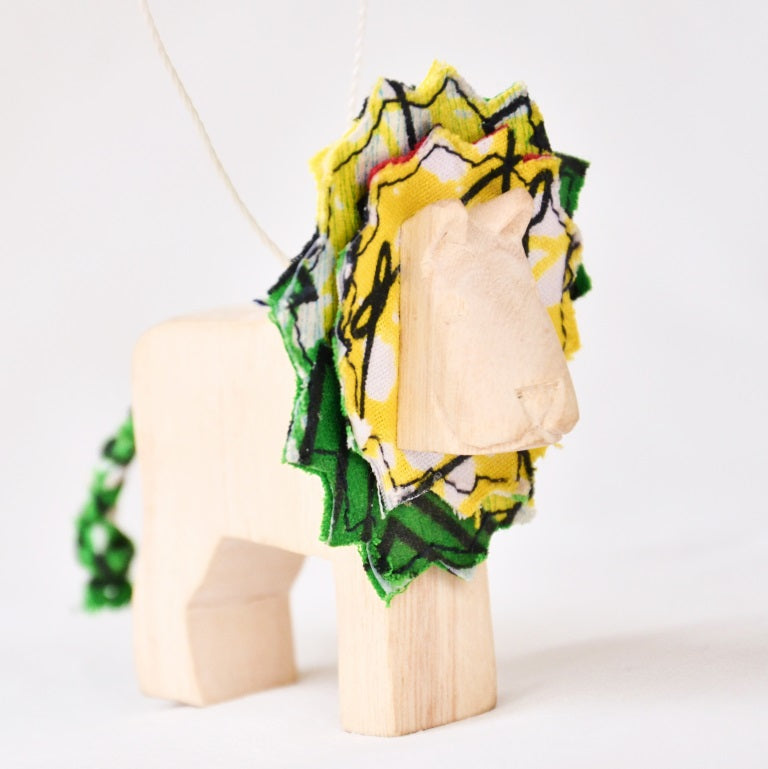 Hand Carved Animal Ornament in Natural Wood