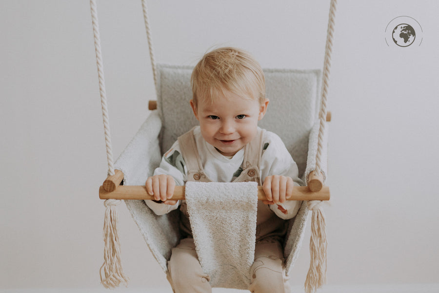 Sustainable Bouclé Baby Swing – Comfort & Nordic Style by Nofi KIDS at www.brixbailey.com