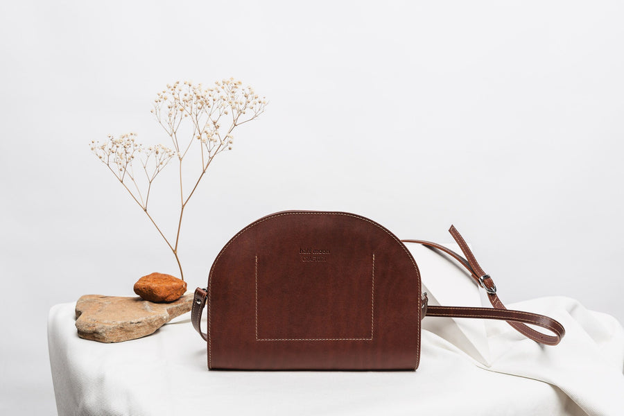 Crescent-Shaped Leather Clutch – Sleek & Versatile Design by Craftory at brixbailey.com