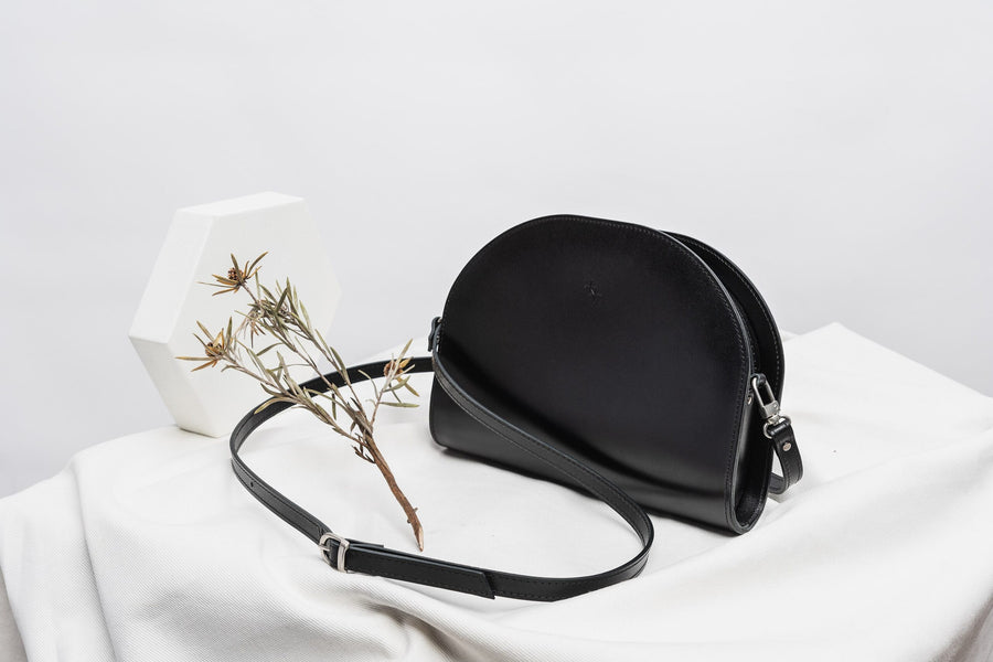 Crescent-Shaped Leather Mini Moon Bag – Chic & Versatile by Craftory at brixbailey.com