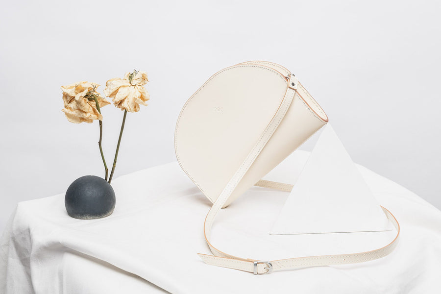 Crescent-Shaped Leather Clutch – Versatile & Chic Design by Craftory at brixbailey.com