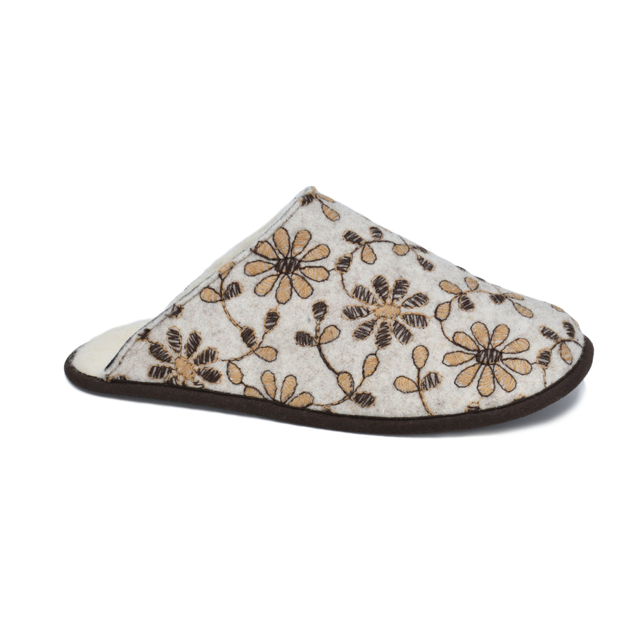 These Jugu Slippers: Handcrafted European Wool Slippers with Embroidered Floral Design - Warm & Sustainable by Omaking at www.brixbailey.com