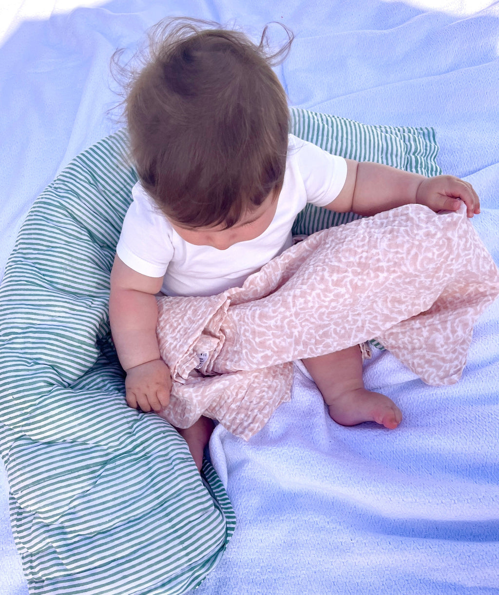 Coral Muslin Swaddle
