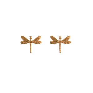 bold close-up of gold dragonfly earrings with a confident, radiant shine