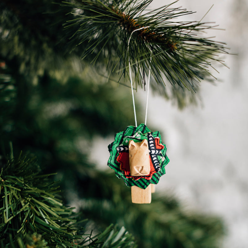 Hand Carved Animal Ornament in Natural Wood