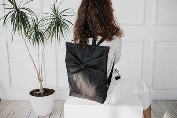 Black Bow Backpack – Chic, Waterproof & Spacious by Muni at brixbailey.com