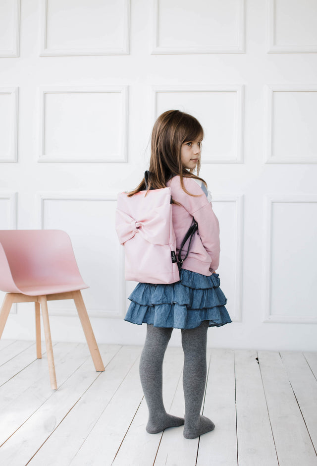 Playful Pink Bow Backpack – Perfect for Kids 4-10 Years by Muni at www.brixbailey.com