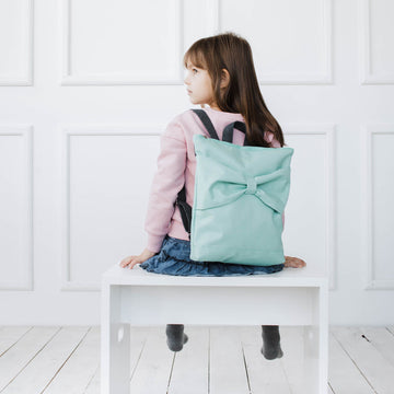 Mint Bow Backpack for Kids – Waterproof & Stylish by Muni at www.brixbailey.com