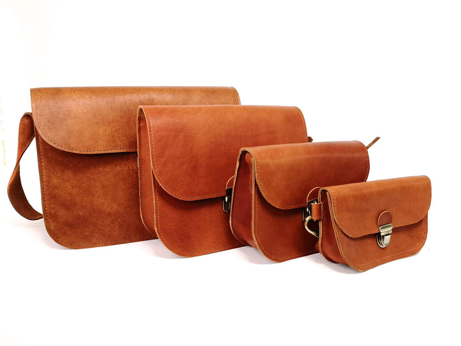 Classic Cut Leather Saddle Bag – Timeless & Versatile by Zelma Kraft at brixbailey.com