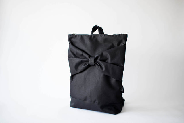 Black Bow Backpack – Stylish & Waterproof with Elegant Detailing by Muni at brixbailey.com