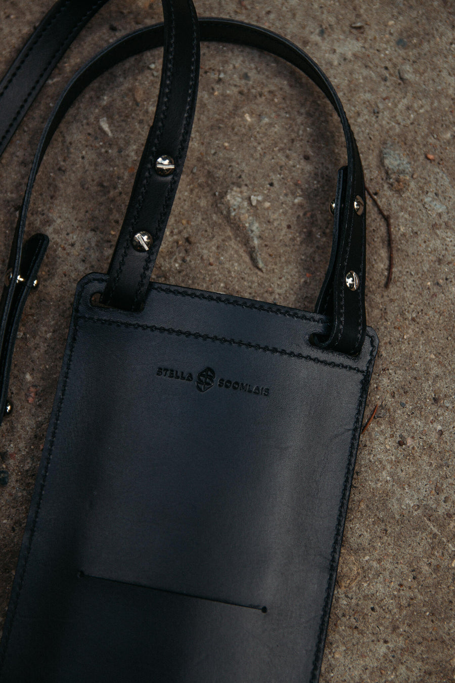 Eco-Friendly Leather Phone Bag – Secure & Stylish by Stella Soomlais at brixbailey.com