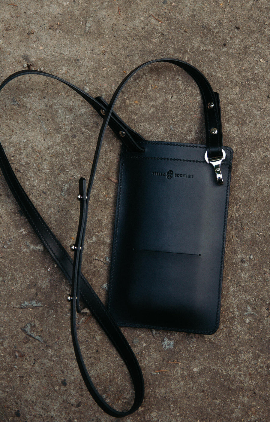 By Your Side Leather Phone Bag – Secure & Eco-Conscious Design by Stella Soomlais at brixbailey.com