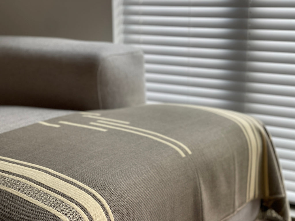 Equinoccio Throw Blanket in Cedar Brown