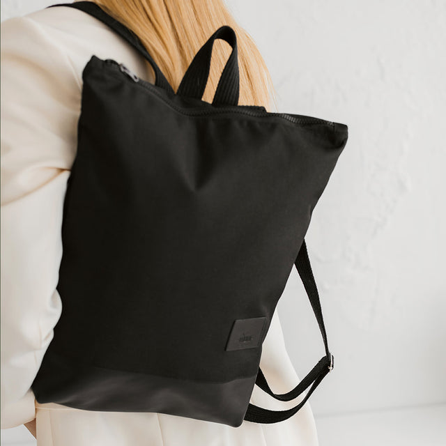 Waterproof Black Leather Backpack – Stylish & Practical by Muni at www.brixbailey.com