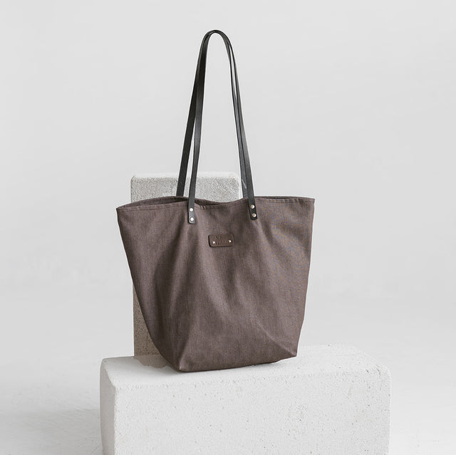 Brown Denim Tote Bag with Leather Handles – Stylish & Durable by Muni at www.brixbailey.com