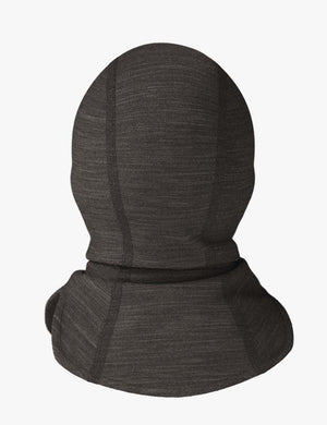 a soft merino wool baby balaclava shown in gentle morning light, offering a cozy and comforting fit for a newborn