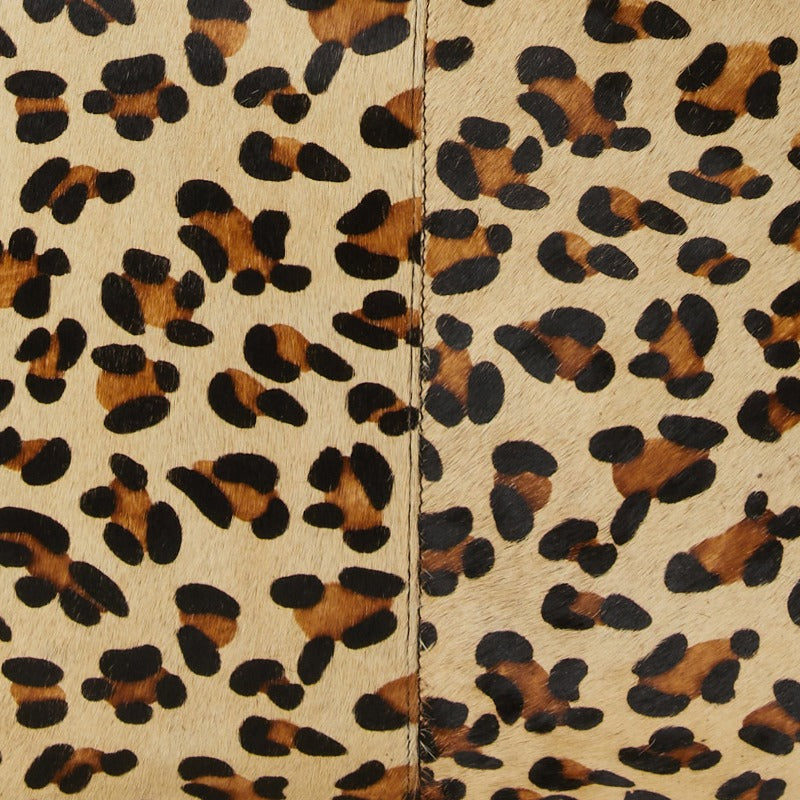 Animal Print Leather Grab Bag – Stylish & Sustainable by Brix + Bailey by Brix + Bailey at brixbailey.com