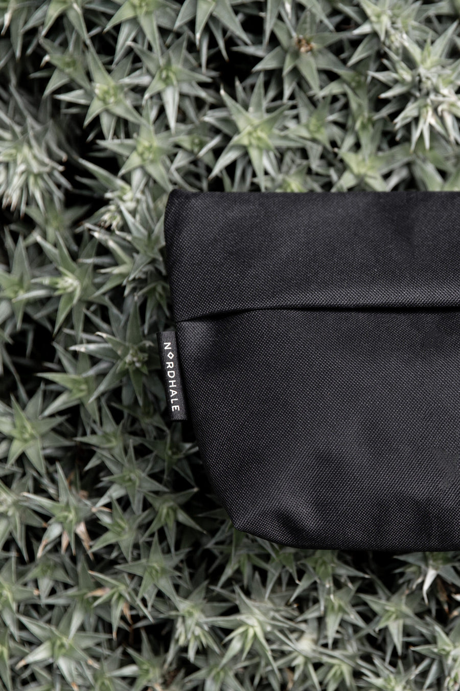 NES Unisex Toiletry Bag – Water-Repellent & Travel-Friendly by Nordhale at brixbailey.com