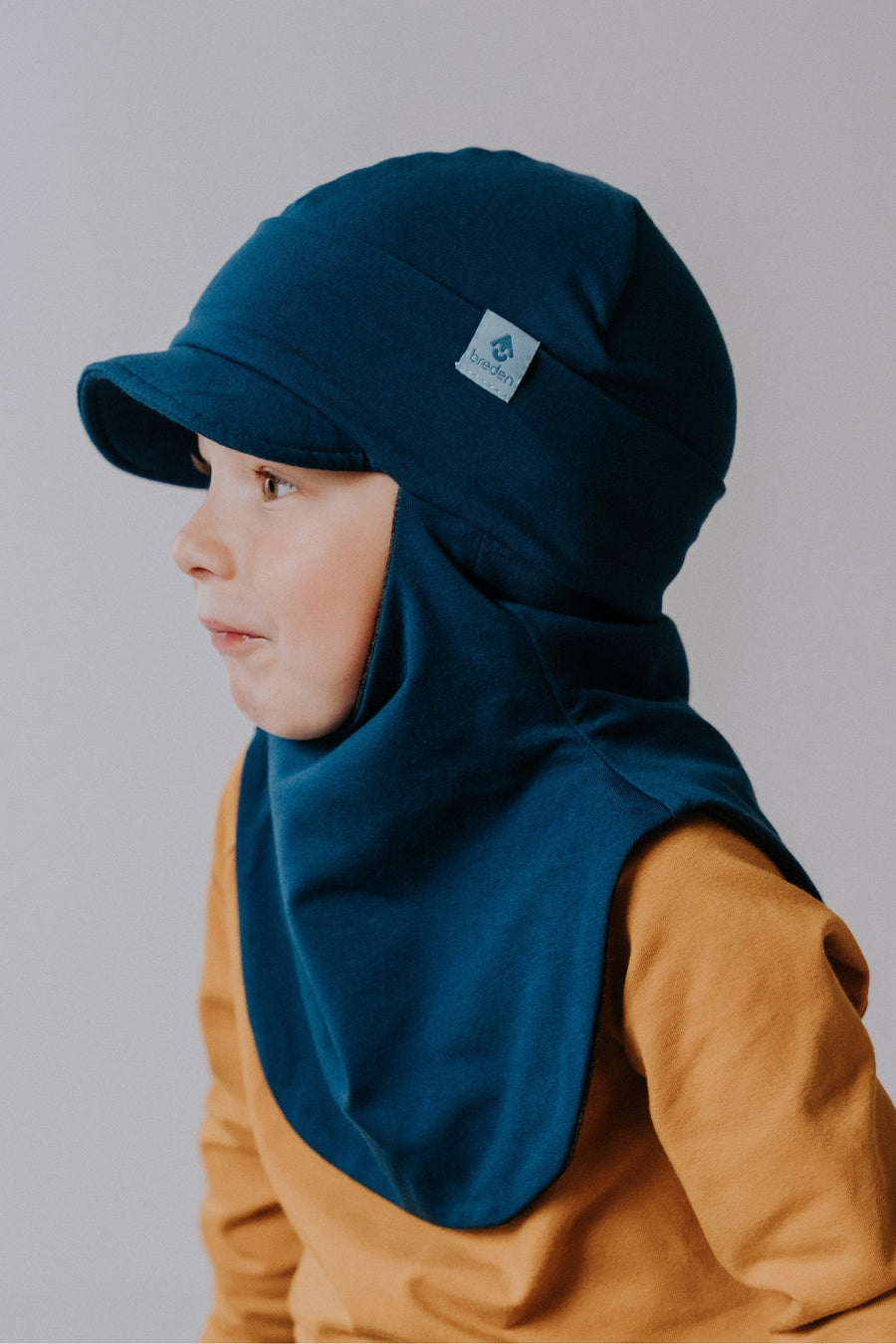 Merino-Lined Peaked Hat-Scarf – Versatile & Weatherproof by Breden at brixbailey.com