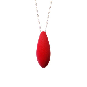 bold close-up of the mini cherry pendant with its cosmic dust glow on a 45cm silver chain