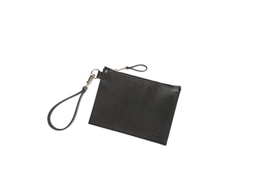 Sleek Black Leather Clutch – Luxurious & Modern Style by PYKOK at brixbailey.com