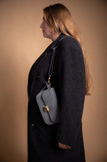 Classic Cut Saddle Bag by Zelma Kraft – Timeless Elegance & Utility by Zelma Kraft at brixbailey.com