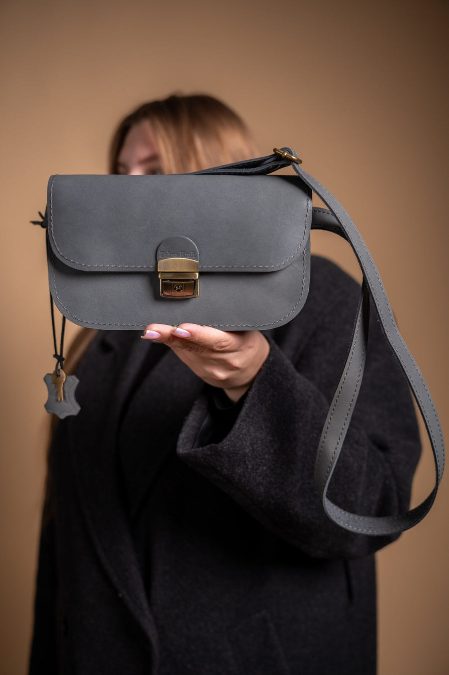 Classic Cut Saddle Bag by Zelma Kraft – Elegant & Versatile by Zelma Kraft at brixbailey.com