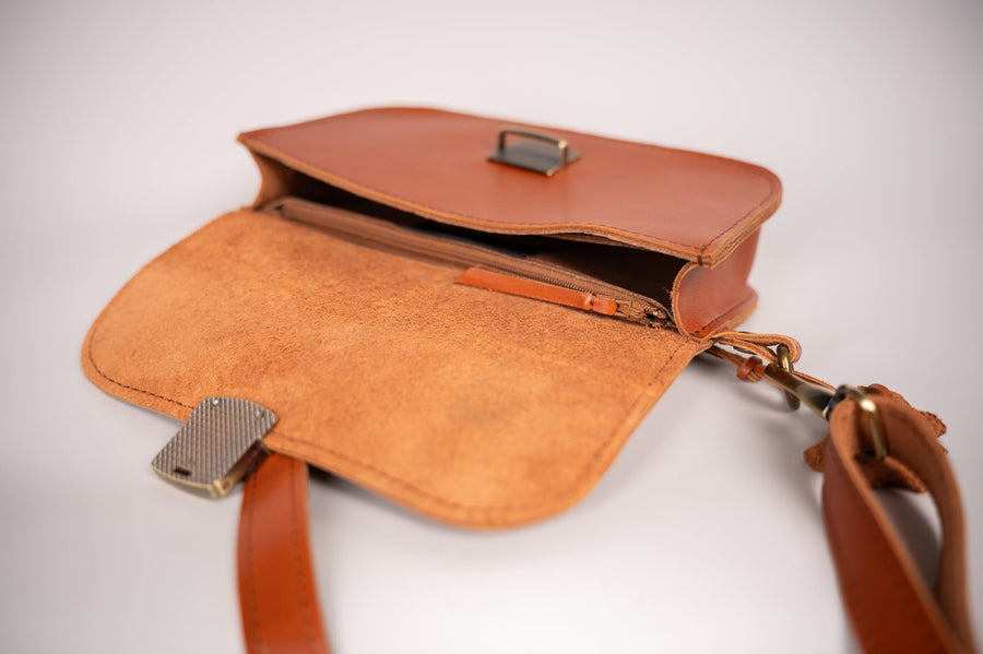 Classic Cut Saddle Bag by Zelma Kraft – Vintage Elegance & Durability by Zelma Kraft at brixbailey.com