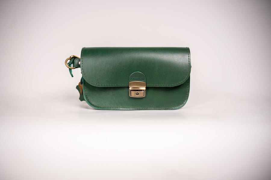 Classic Cut Saddle Bag by Zelma Kraft – Vintage Elegance by Zelma Kraft at brixbailey.com