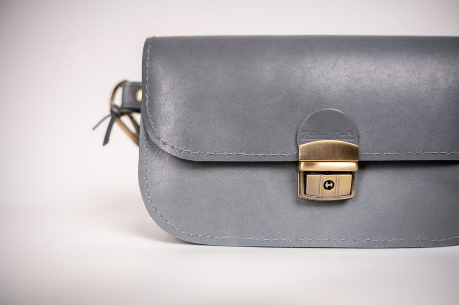 Zelma Kraft Classic Cut Saddle Bag – Timeless Leather Elegance by Zelma Kraft at brixbailey.com