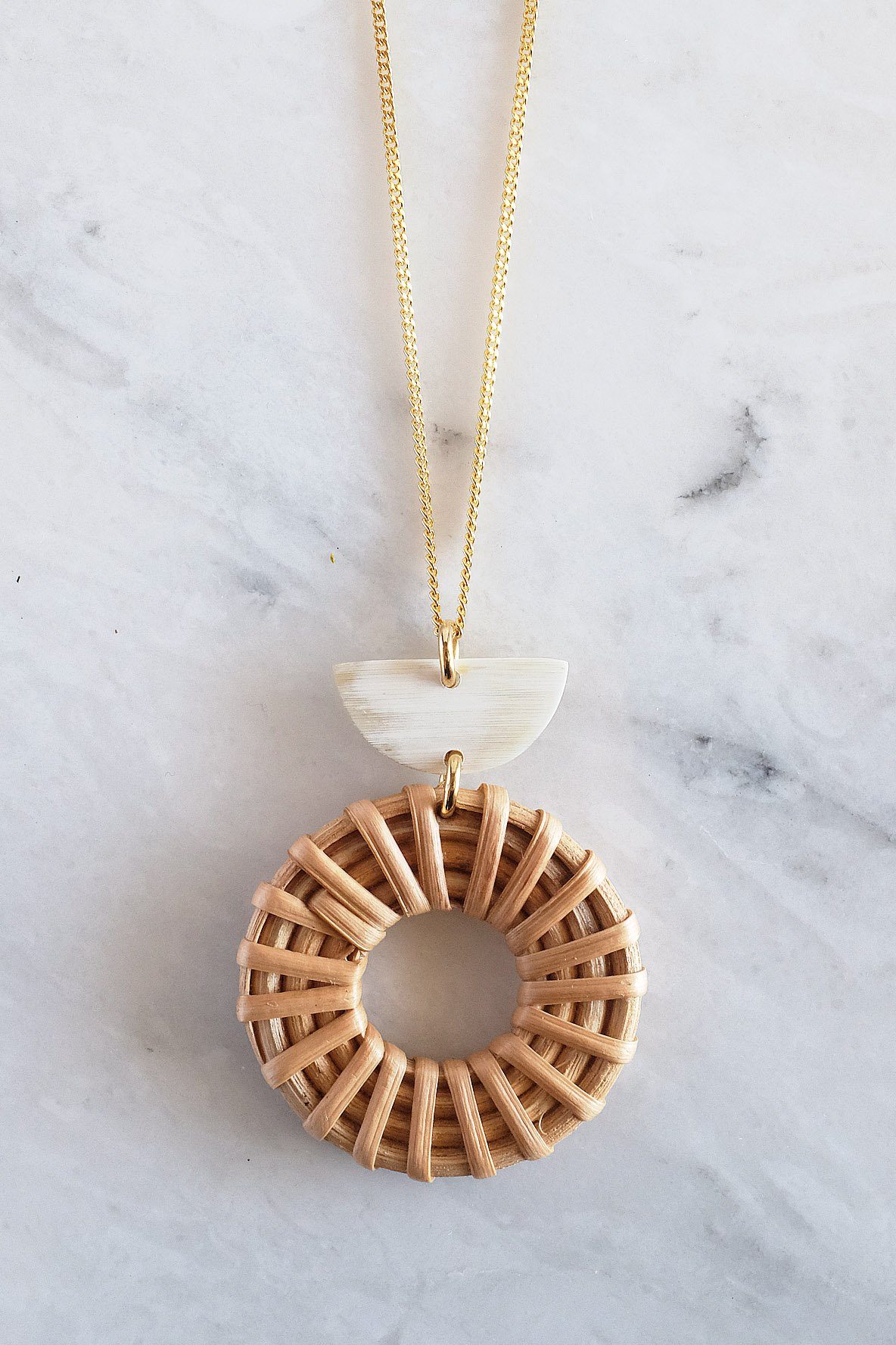 Crescent Horn and Rattan Donut Pendant Necklace