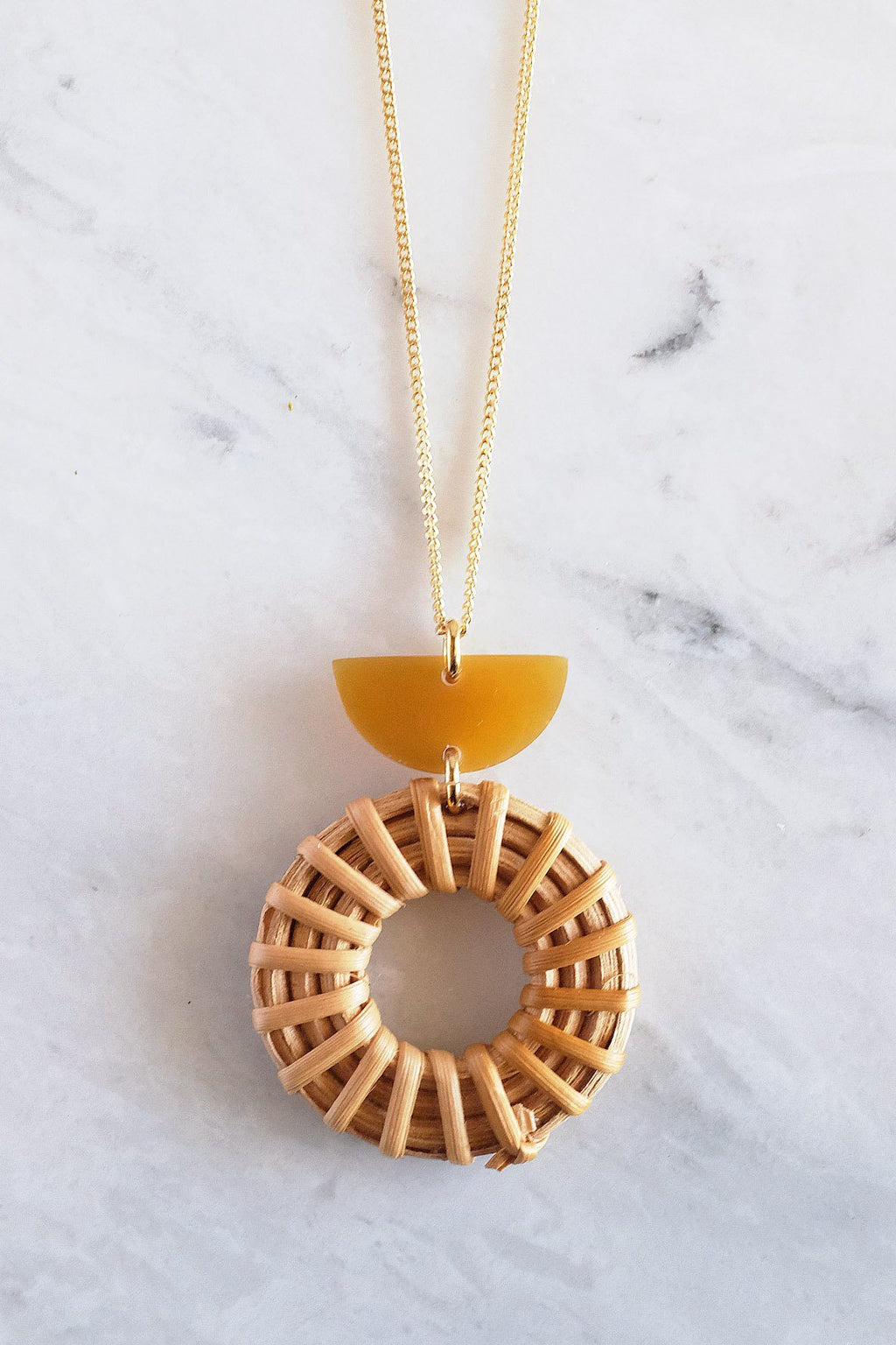 Crescent Horn and Rattan Donut Pendant Necklace