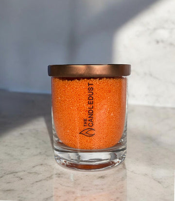 Add a Burst of Color with The Candledust 160 Orange Candle - Elevate Home Ambiance by Candledust at www.brixbailey.com