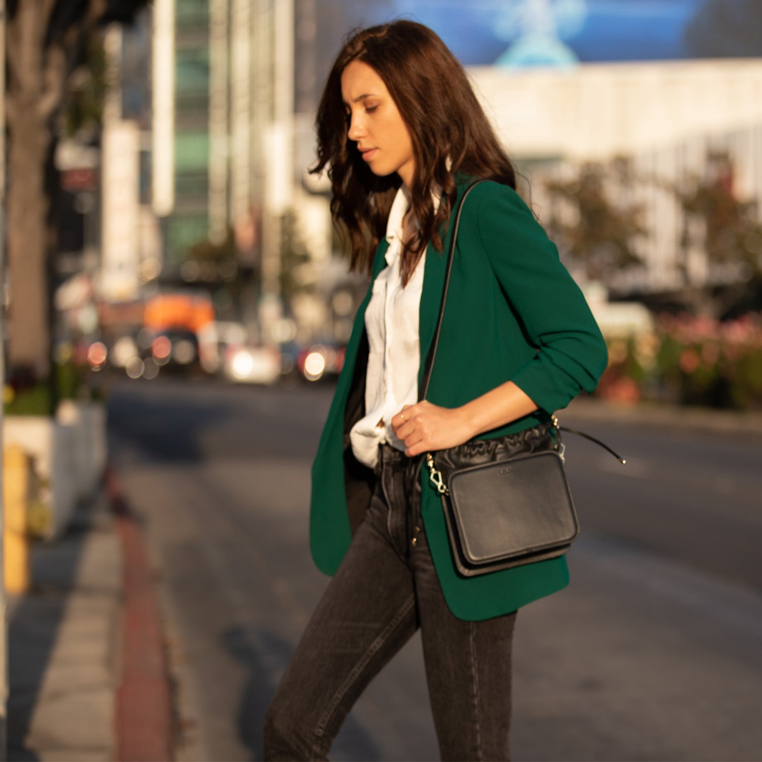 Black Leather Bucket Bag with Drawstring and Gold Hardware