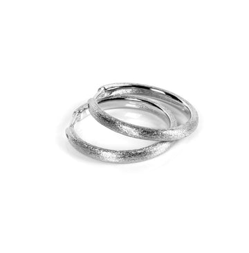 Elegant MyaMoon Sugar Hoop Earrings – Brushed Silver 25mm by MyaMoon at www.brixbailey.com