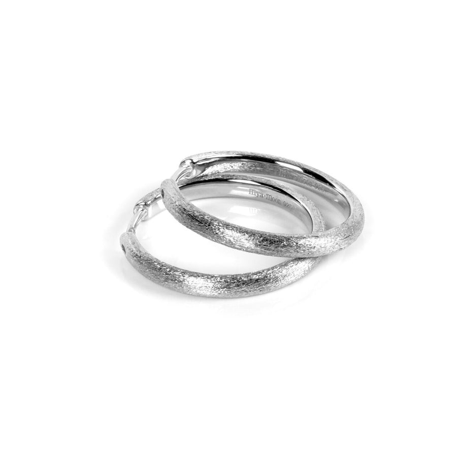 Elegant MyaMoon Sugar Hoop Earrings – Brushed Silver 25mm by MyaMoon at www.brixbailey.com