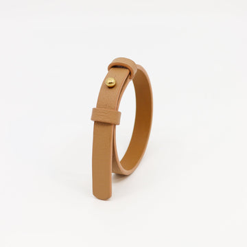 Elegant Double-Layered Leather Bracelet with Brass Fastener by Tairi Roosve at www.brixbailey.com