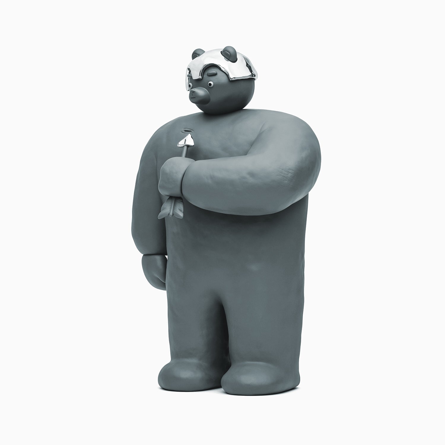 A Bear With An Arrow Sculpture