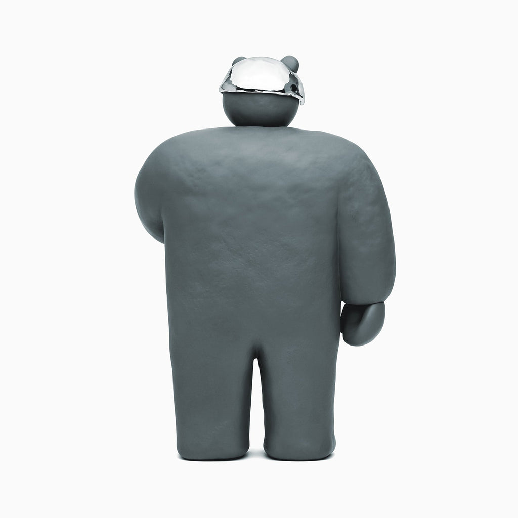 A Bear With An Arrow Sculpture