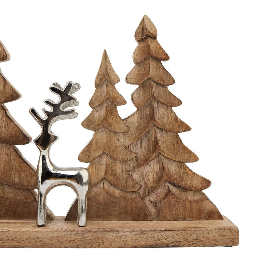 Handcrafted rustic-modern holiday decor with wood and metal geometric patterns, casting elegant seasonal shadows. by Sostter at brixbailey.com