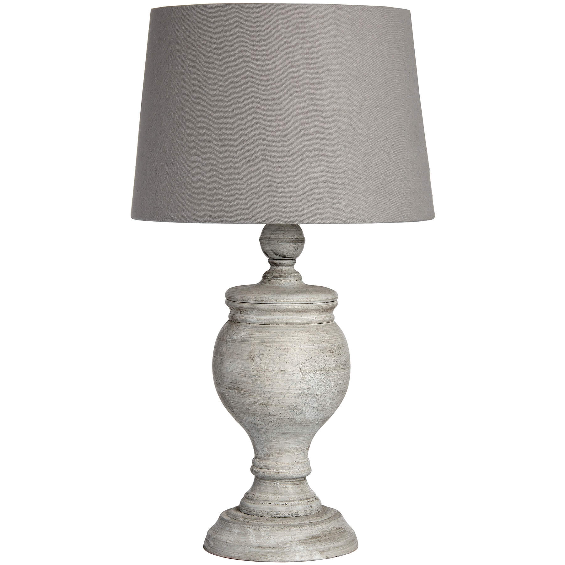 Uthina table lamp with wood base and linen shade in warm beige, creating soft ambient lighting for modern or traditional decor by Sostter at brixbailey.com