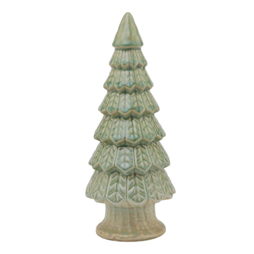 Handcrafted matte green ceramic Christmas tree sculpture with minimalist design and weighted base for holiday dÃ©cor. by Sostter at brixbailey.com