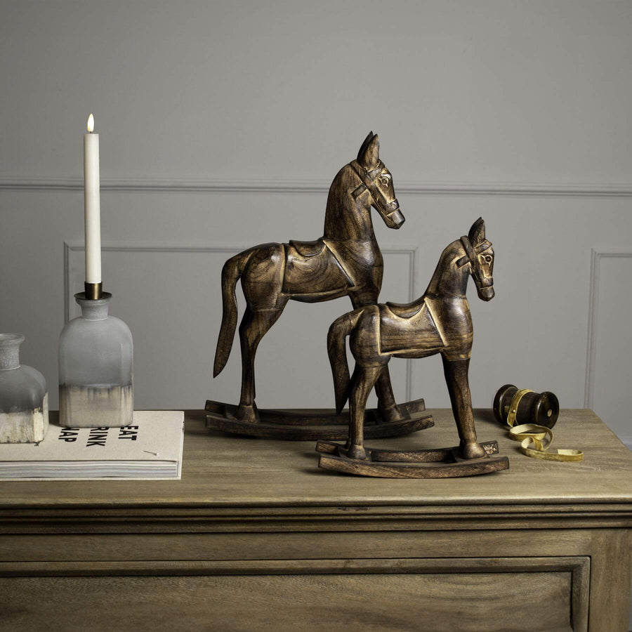 Natural wooden rocking horse for kids, handcrafted solid wood with warm brown finish, safe nursery toy. by Sostter at brixbailey.com