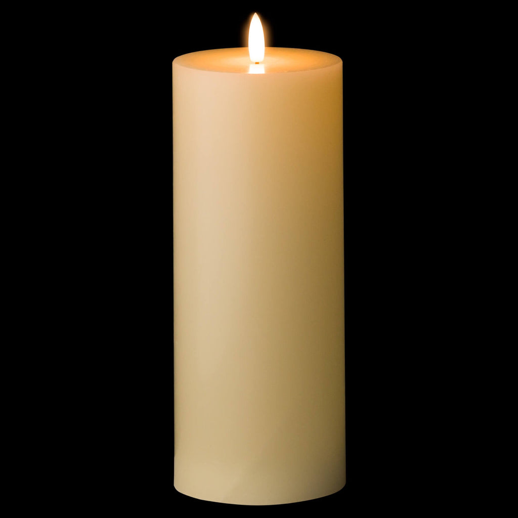 Realistic ivory LED candle with flickering glow, wax-like finish, and timer for safe, elegant ambiance by RoomLondon at brixbailey.com