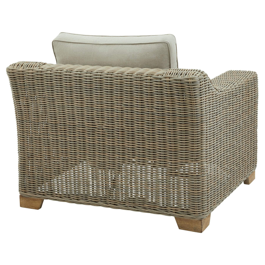 Premium outdoor armchair with HDPE wicker weave, powder-coated aluminum frame, and beige olefin cushions for all-weather comfort by Sostter at brixbailey.com