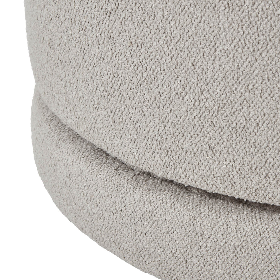 Plush Aspen swivel ottoman in neutral tone with hidden storage and 360-degree rotation by Sostter at brixbailey.com