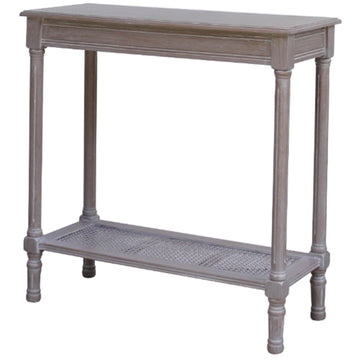 Handwoven rattan console table with tapered legs in soft grey finish, perfect for modern farmhouse or coastal decor. by Sostter at brixbailey.com